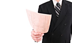 A faceless man with a pink slip