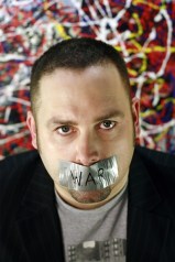 Paul Barnett, with tape over his mouth. 