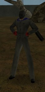 A black, faceless figure in a suit. With a scarf. But not one of those hipster scarves. 