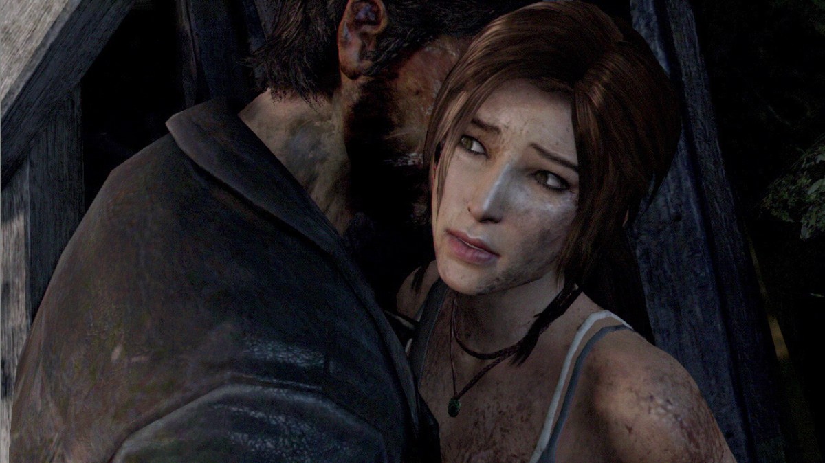 A man standing awfully, awfully close to the vulnerable Lara Croft