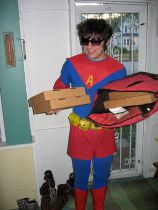 Someone in a pseudo Superman suit delivering pizzas. 