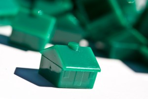 A green house from Monopoly, that board game about capitalism where you have a good chance to end up bankrupt and homeless.