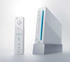 A photo of a white Wii and a Wiimote. No nunchuck shown, but you'll need that too.