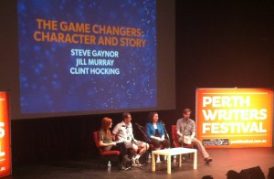 It's four people on a panel with a large blue screen overhead
