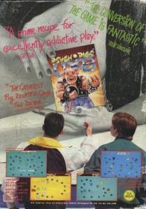 An ad for Psycho Pigs UXB which has the game held up over a women's breat. Two teenage boys are looking at the game.
