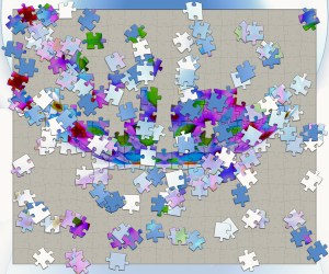 A picture of an unfinished jigsaw puzzle; the pieces are multiple colours