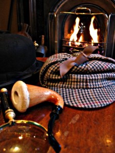 A pipe, stove hat and general Englishness.